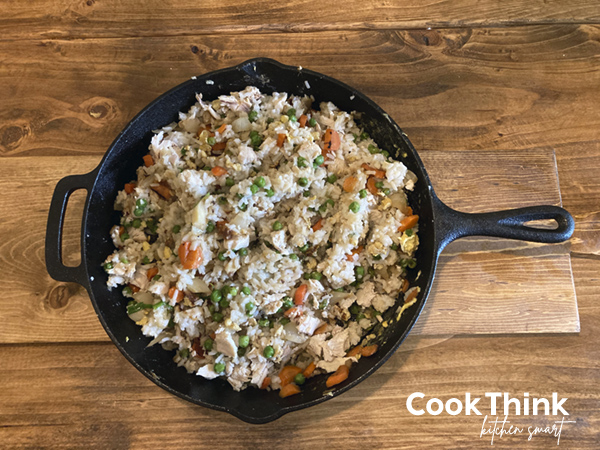cast iron pan with chicken fried rice