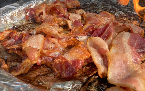 Bacon cooked on the grill. Photo by CookThink.