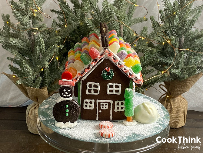 oreo gumdrop gingerbread house with snowball