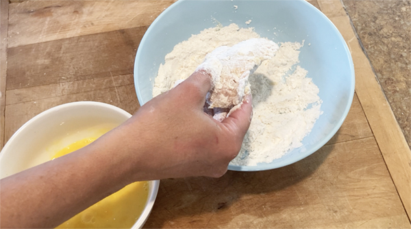 dallas wings sauce dipping chicken in flour mixture