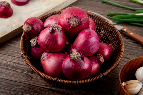 red onions in a basket