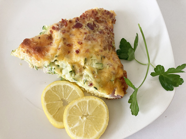 slice of quiche on a white plate