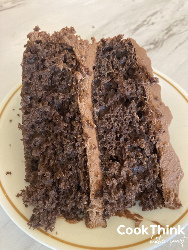 gluten free chocolate cake slice with frosting