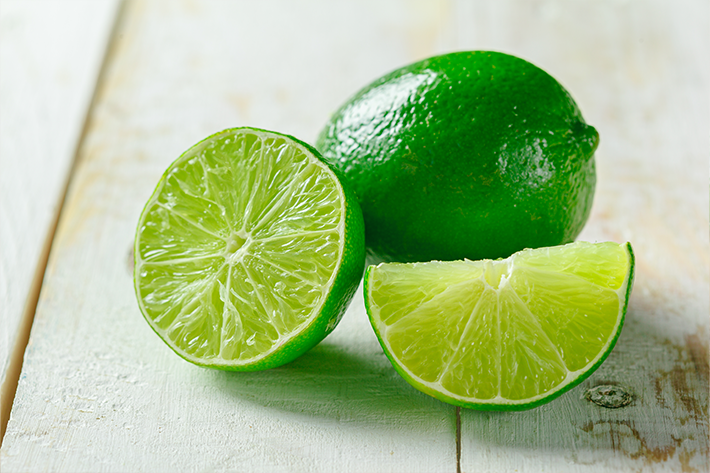 limes on white wood
