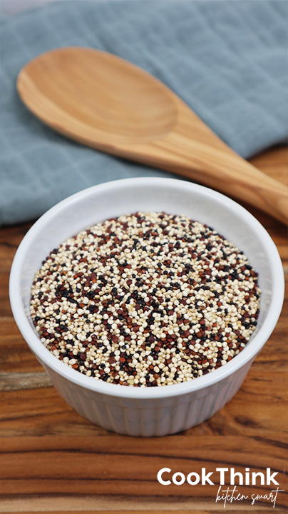quinoa with wooden spoon