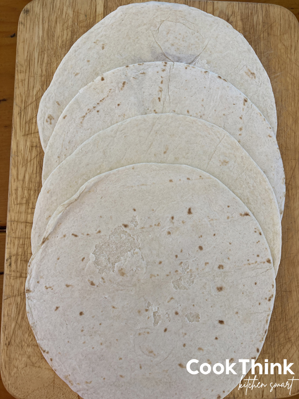 tortillas on cutting board