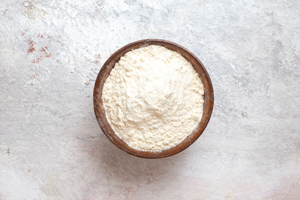 flour inside plate on white background flour