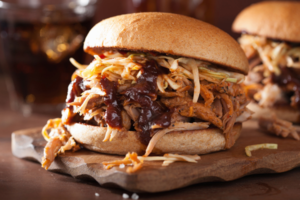 homemade pulled pork burger with coleslaw and bbq sauce