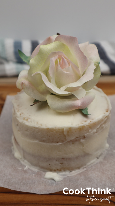 white cake with flower