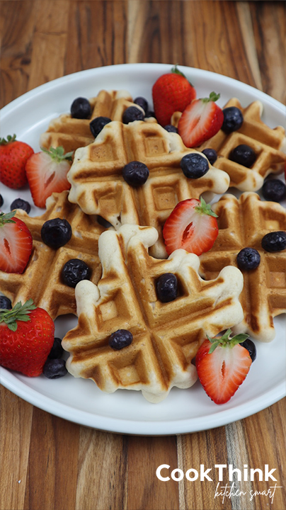 mini waffles sliced strawberries and blueberries