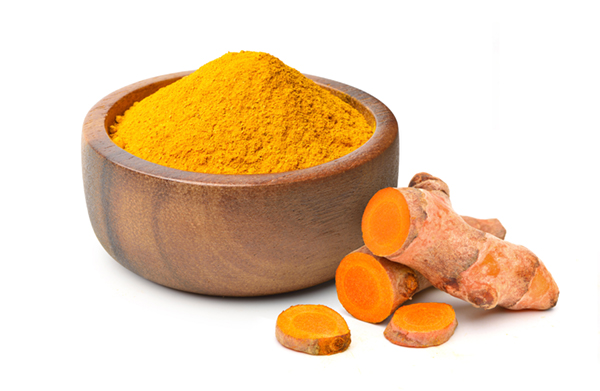 turmeric root with powder