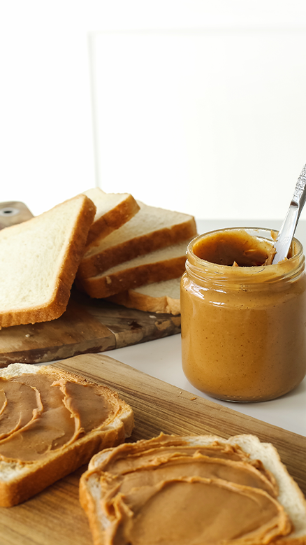 Peanut butter jar on bread