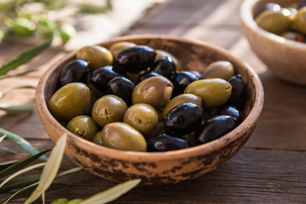 olives in a wood bowl