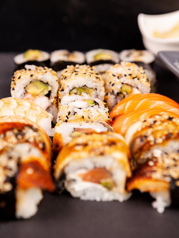 variety of sushi rolls