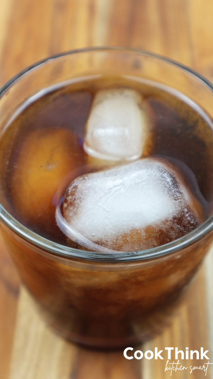 coffee soda with ice cubes