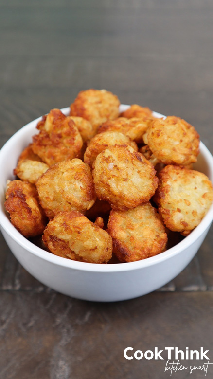 tater tot crowns in a white bowl
